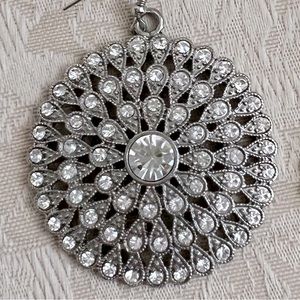 Forever 21 dangle rhinestone earrings, nickel-free, 1.75” diameter.